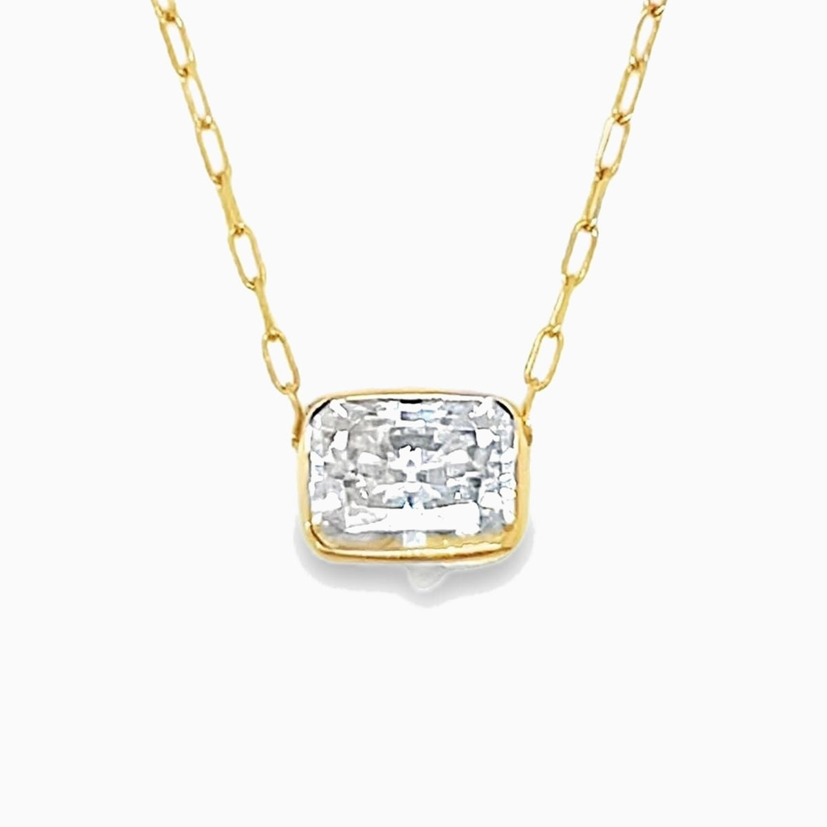 East-west bezel solitaire necklace on a 14k gold paperclip chain, 2 ct
