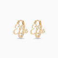 Gold hoop earrings with a script name set across the hoop