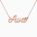 Rose gold name necklace with a pink heart birthstone