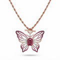 Pink open-work butterfly pendant with emerald-cut pink center stone on a rose gold rope chain with toggle clasp